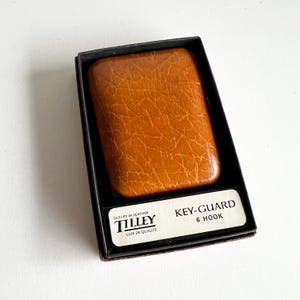 vintage Tilley Keymatic, étui à clés en cuir marron, cuir d'érable chasseur, 6 crochets pour clés, dans sa boîte d'origine, cadeau pour amoureux du milieu du siècle