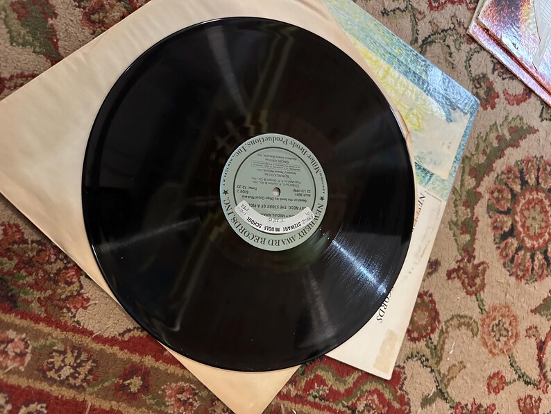 May include: A black vinyl record with a white label that reads "Award Record Records Inc. Stereo 33 1/3 RPM", "Music Most Reproductions", and "Manufactured and Distributed by Award Record Records Inc. 1967".