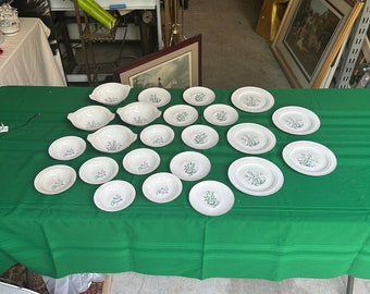 Collection of Small Plates and Bowls With Different Flower Designs