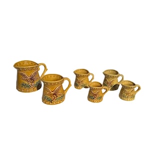 Collection of Yellow Ceramic Measuring Cups With Eagle Accents- Set of 6