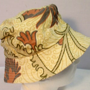 Beige bucket hat, linen with printed brown and orange design, linned with beige cotton, size M, ready to ship