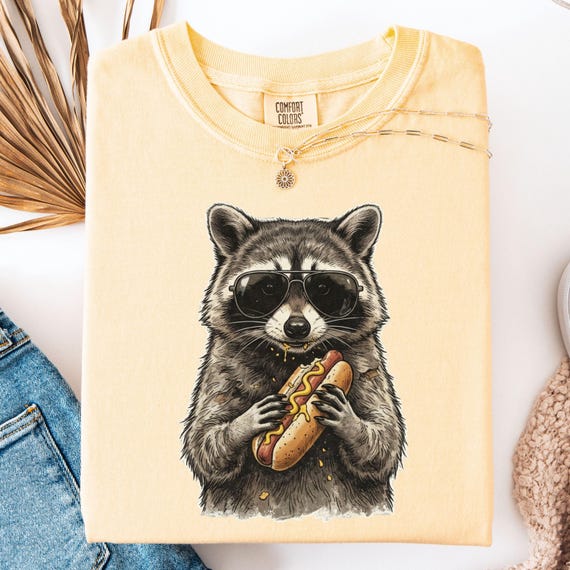 Comfort Color@Raccoon Eating Hot Dog Graphic T-Shirt,Funny Animal Meme Shirt ,Funny Raccoon Hotdog Tee,Cool Raccoon With Sunglasses Tee