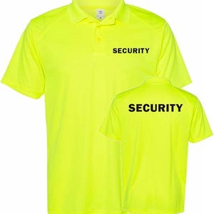 May include: Bright yellow polo shirt with the word "SECURITY" printed in black on the front and back. The shirt has a collared neckline and short sleeves. The fabric appears to be a lightweight, breathable material.