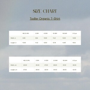 May include: A size chart for a toddler organic t-shirt, with measurements in inches and centimeters. The chart includes sizes from newborn to 2-3 years, detailing width and length measurements for each size. The text "SIZE CHART" is at the top.