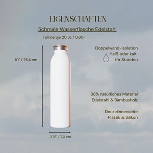 May include: A white stainless steel water bottle with a metallic cap. Text indicates a 20 oz capacity, 10 inch height, and 2.75 inch diameter. Features include double-wall insulation for hot or cold liquids, and construction from stainless steel, bamboo, plastic, and silicone.
