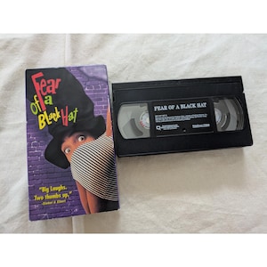 May include: A rustic wooden sign with the text "Welcome to our home" in white lettering. The sign features a distressed finish and a simple, inviting design, perfect for a front porch or entryway.