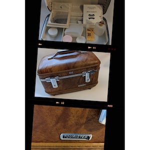 May include: A vintage brown Tourister vanity case with silver-tone hardware. The case has a handle and opens to reveal compartments and accessories. The Tourister logo is visible on the front. The case is approximately 14 inches wide, 10 inches tall, and 8 inches deep.