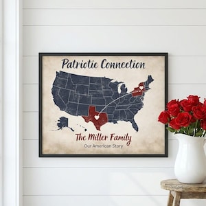 May include: Framed map art of the United States with a focus on Texas and New York, connected by a dotted line. The map is navy blue with red accents, and the text reads "Patriotic Connection" and "The Miller Family: Our American Story."