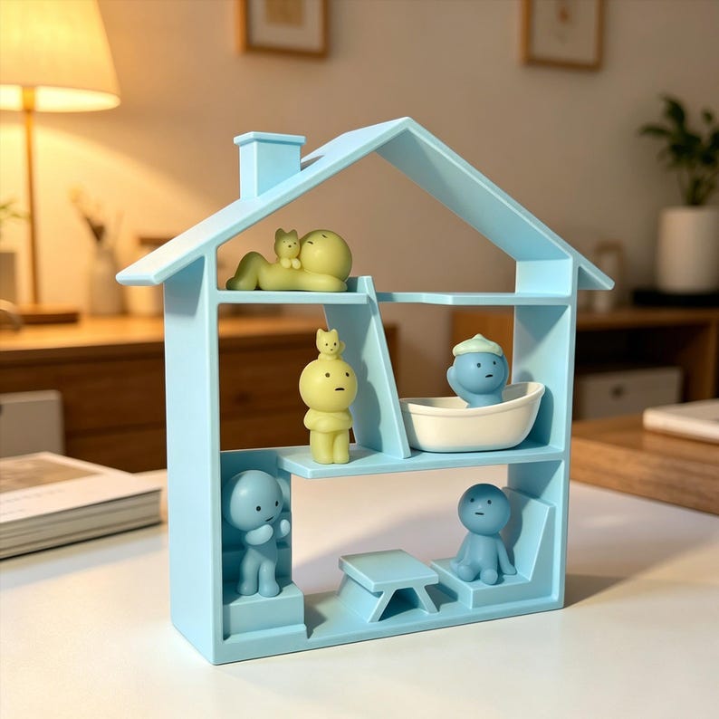 May include: A light blue miniature house-shaped shelf with several figurines. The figurines are in various poses, including reclining, standing, and sitting. The shelf has a chimney and a pitched roof. The figurines are in yellow and blue colors.