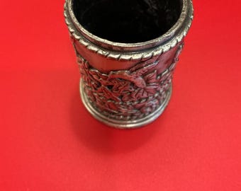 Vintage pewter stamp dispenser.