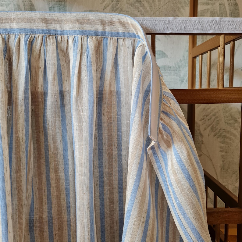 Sky blue stripe viscose linen blend cabinet curtain with adhesive hook and loop attachment, featuring a natural linen background and soft blue woven stripes.