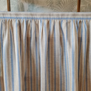 Close-up of the sky blue stripe viscose linen blend cabinet curtain highlighting the woven texture, premium stitching, and elegant blue stripe design.