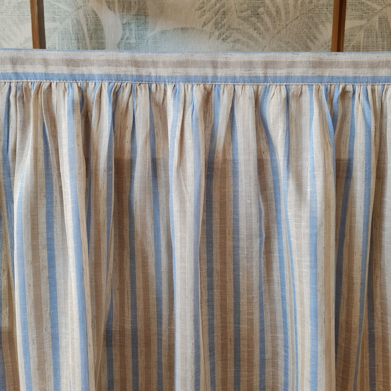 Close-up of the sky blue stripe viscose linen blend cabinet curtain highlighting the woven texture, premium stitching, and elegant blue stripe design.