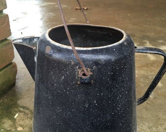 Blue enamelware coffee pot