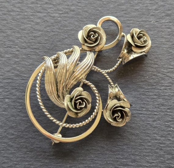 Bond Boyd sterling silver floral brooch