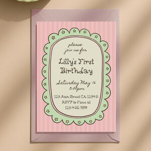 May include: A pink and white striped invitation card for Lilly's First Birthday. The card features a scalloped border with star accents and includes event details: date, time, location, and RSVP information.