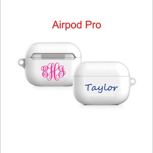 May include: Two white Airpod Pro cases. One case has a pink monogram "EFS" and the other case has the name "Taylor" written in blue.
