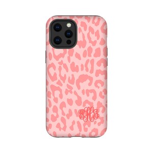 May include: A pink phone case with a leopard print design and a monogram of the letters "HHS" in coral pink.