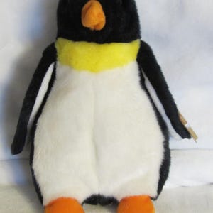 May include: A set of three ceramic mugs with a speckled, matte finish. The mugs are in shades of cream, light gray, and dark gray. Each mug has a simple, minimalist design, perfect for coffee or tea.