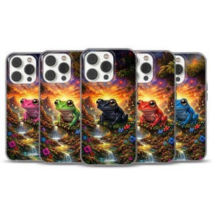 May include: A set of phone cases with frog illustrations. Each case displays a different coloured frog: pink, green, black, red, and blue, set against a vibrant sunset landscape with waterfalls and flowers.