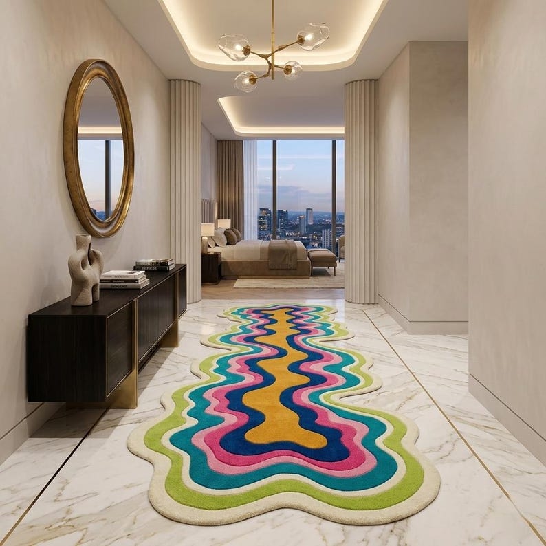 Colorful wavy abstract area rug featuring layered organic curves in green, turquoise, pink, navy blue, mustard yellow, and ivory. Plush raised tufted texture and sculptural irregular shape create a bold modern statement. Shown in a luxury hallway and on a neutral floor, this colorful area rug is ideal for living rooms, bedrooms, hallways, studios, offices, and contemporary interiors.