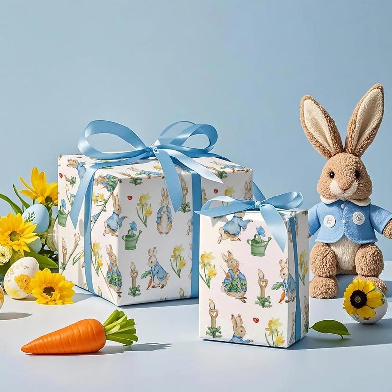 May include: Two wrapped gifts with blue ribbons, featuring a bunny and floral pattern. A plush bunny toy in a blue jacket sits nearby. A carrot, flowers, and decorated Easter eggs complete the scene, all set against a light blue backdrop.