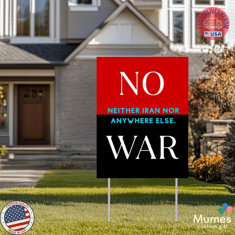 May include: A rectangular yard sign with a red and black background. The top red section has the word "NO" in white. The black section has the word "WAR" in white. The text "NEITHER IRAN NOR ANYWHERE ELSE" is in between.
