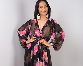 Chiffon maxi dress with long sleeves. See through dress for women. Elegant black dress with big flower print and ruffles