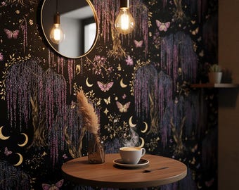 May include: A cafe interior with a round wooden table and a cup of coffee. The dark wallpaper features a pattern of trees, butterflies, and moons. A gold-framed mirror and a hanging light bulb create a warm atmosphere. The scene evokes a sense of calm.