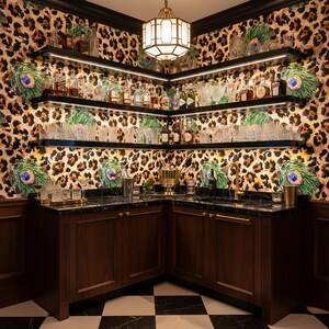 May include: A home bar with dark wood cabinetry, a black countertop, and shelves stocked with glassware and liquor bottles. The walls are covered in leopard print wallpaper with peacock feather accents. A brass chandelier hangs from the ceiling.