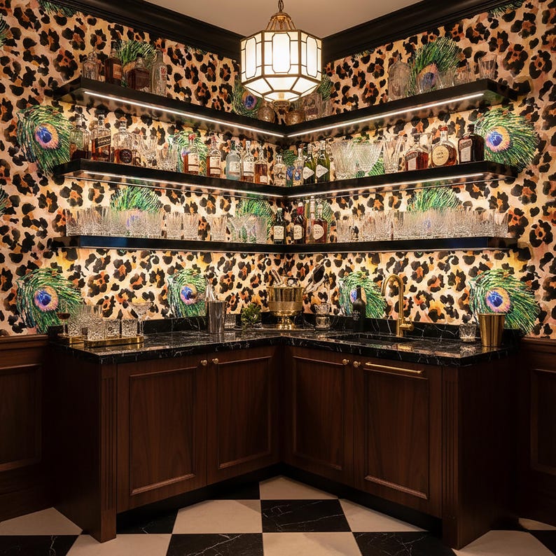 May include: A home bar with dark wood cabinetry, a black countertop, and shelves stocked with glassware and liquor bottles. The walls are covered in leopard print wallpaper with peacock feather accents. A brass chandelier hangs from the ceiling.