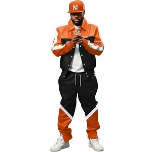 May include: A two-piece tracksuit in orange, black, and white. The jacket is orange with black and white accents, and the pants are black with orange and white details. A matching orange baseball cap completes the outfit.