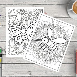 May include: Two black and white coloring pages featuring insect and floral designs. One page has a butterfly, the other a mosquito. Crayons, colored pencils, and watercolor paints surround the pages, ready for use.