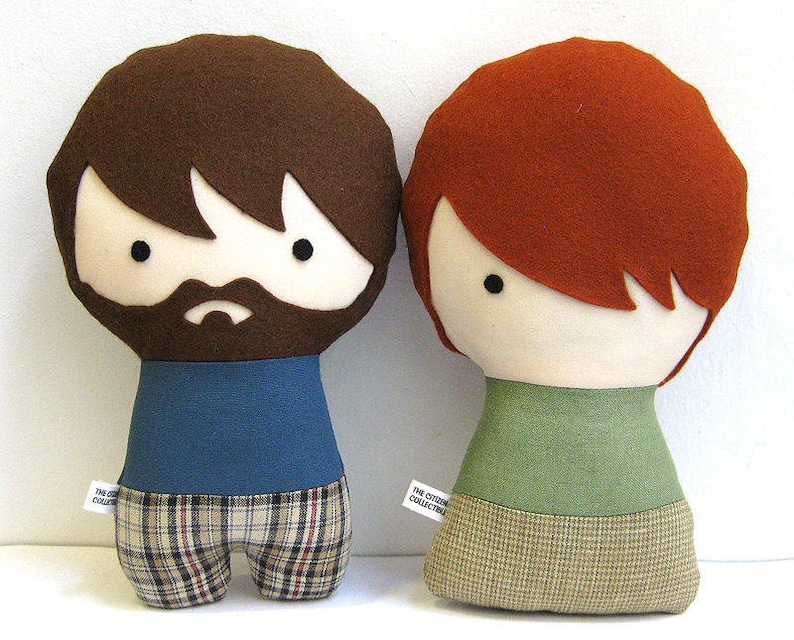 Custom made dolls resembling your beloved ones. The picture shows a sample of a man with beard and a woman with bangs. You can add glasses, beard, hair color and style, and chose the fabrics for top and bottom. Made out of cotton and wool felt.