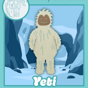 May include: A Yeti pre-cut wool appliqué kit featuring a cream-colored, shaggy-textured creature with a brown face, teal eyes, and a teal mouth. The text reads Wooly Flourish, Emerald Falls Quilts, Yeti, and Cryptids Pre-cut Wool Appliqué Kit.