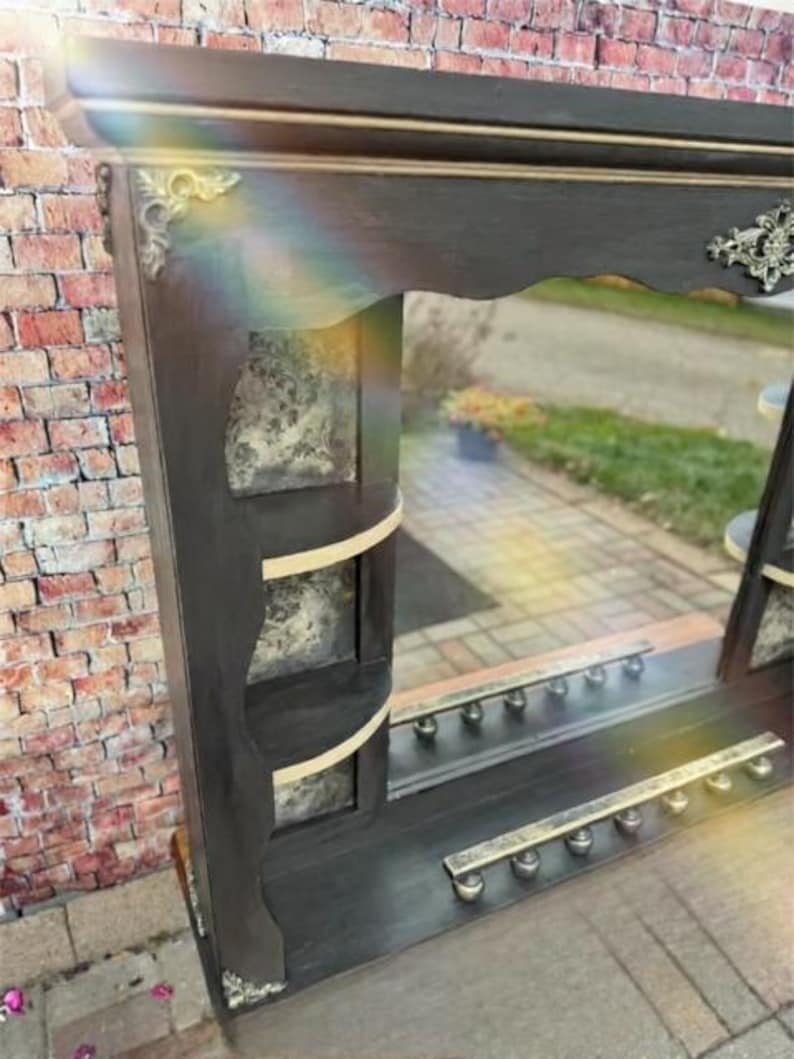 Photo inspiration: Gallery Detail: Antique Style Black And Gold Mantel Mirror With Built In