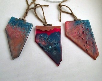 State of Nevada ornaments handpainted with fusible paints and frit