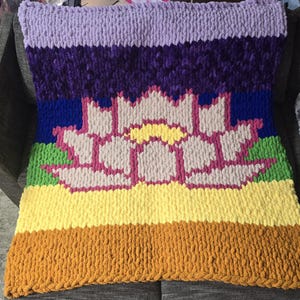 May include: A rustic wooden sign with the text "Welcome to our home" in white lettering. The sign features a distressed finish and a simple, inviting design, perfect for a front porch or entryway.