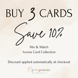 May include: Text-based graphic with a watercolor background. The text reads "BUY 3 CARDS Save 10%" in a mix of fonts. Additional text includes "Mix & Match Across Card Collection" and "Discount applied automatically at checkout."
