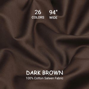 Könnte beinhalten: Dunkelbrauner Stoff aus 100 % Baumwoll-Satin mit einer Breite von ca. 240 cm. Der Stoff hat eine satte, einfarbige Farbe mit dezentem Glanz. Der Text "26 Farben" ist ebenfalls abgebildet.