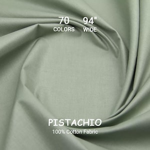 May include: Pistachio-colored 100% cotton fabric, 94 inches wide, with the text "70 Colors" and "Pistachio" printed on the fabric. The fabric is a solid color and appears to be folded.