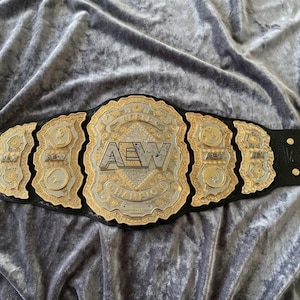AEW Championship Belt Replica | Solid Brass Plates, Genuine Leather Strap, Collector Display