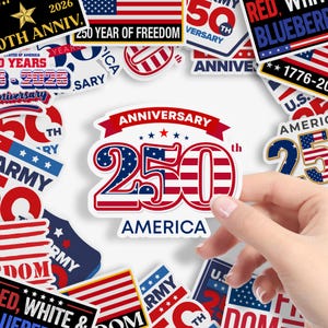 May include: A hand holding a sticker with the text "ANNIVERSARY 250th AMERICA" in red, white, and blue. The sticker is surrounded by other patriotic-themed stickers with flags and text, celebrating the United States of America.