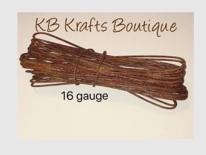 May include: A coil of rusty brown 16 gauge wire.  KB Krafts Boutique.
