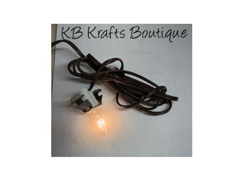Clip Light includes 6 ft brown cord, light bulb and on/off switch