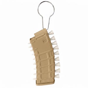 May include: A tan-coloured plastic rifle magazine keyring featuring a grid-like texture on the surface. The magazine is fitted with a silver metal keyring at the top and holds a series of small white golf tees along its side edge.