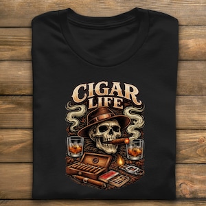 May include: A white ceramic mug with a black handle and the text "But First, Coffee" in a black, bold font. The mug is on a white surface.