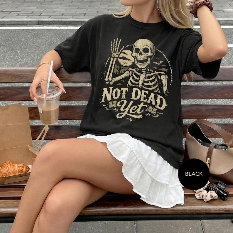 Not Dead Yet Skeleton T-Shirt, Funny Halloween Tee, Spooky Gothic Shirt, Vintage Skull Graphic Top, Dark Humor Apparel, Grim Reapin' Tee
Not