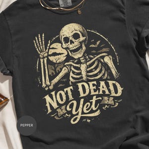 Not Dead Yet Skeleton Shirt, Funny Halloween TShirt, Spooky Skull Design, Vintage Goth Bats, Creepy Humorous Grunge Aesthetic Apparel, Dark