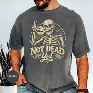 Not Dead Yet Skeleton All products () Vintage Halloween Graphic, Funny Skull Design, Spooky Ghost Bones Gift, Sarcastic Quote
Not Dead Yet